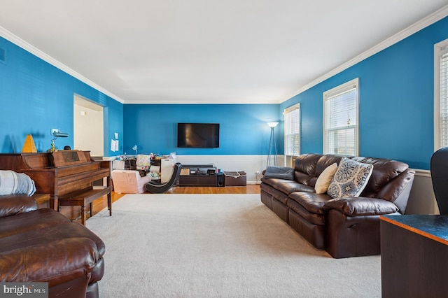 living room with visible vents and ornamental molding