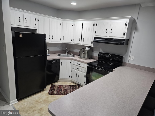 kitchen with a sink, black appliances, white cabinets, extractor fan, and light countertops