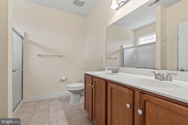 119 Glengarry Ln, Hainesport, NJ 08036 - full bathroom featuring a stall shower, double vanity, baseboards, tile patterned floors, and toilet