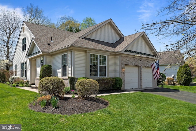 119 Glengarry Ln, Hainesport, NJ 08036 - view of front facade featuring roof with shingles, asphalt driveway, a garage, and a front lawn