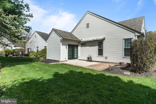119 Glengarry Ln, Hainesport, NJ 08036 - back of house with a lawn, a patio area, and roof with shingles