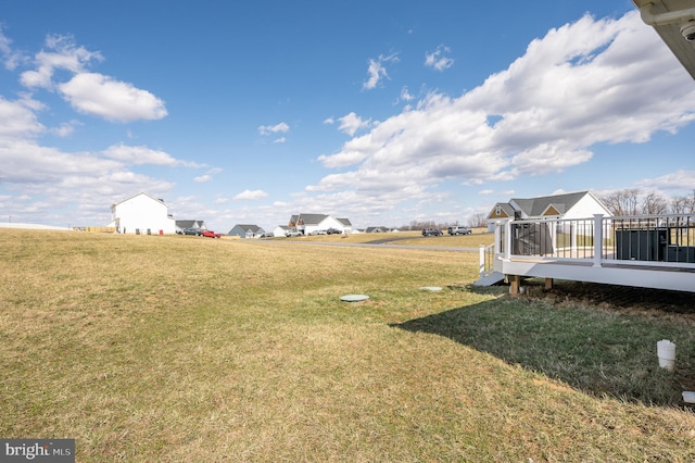 view of yard with a deck