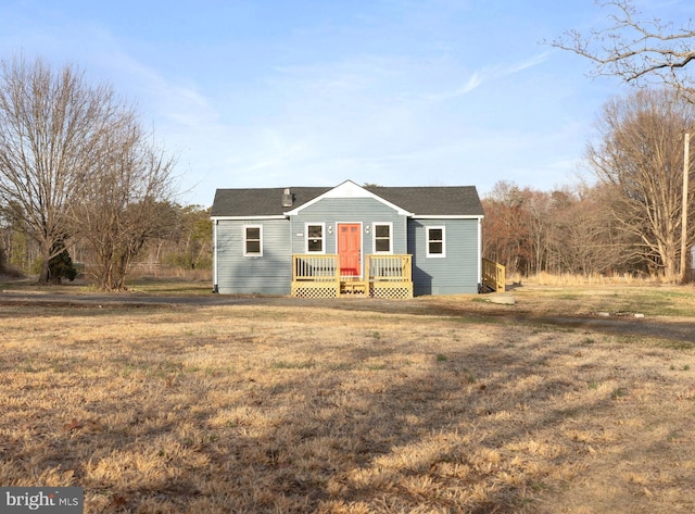 view of front of home with a front yard