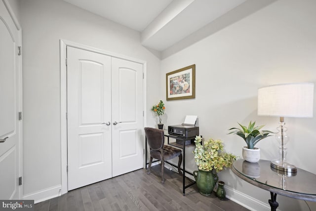 office area with baseboards and dark wood-style flooring