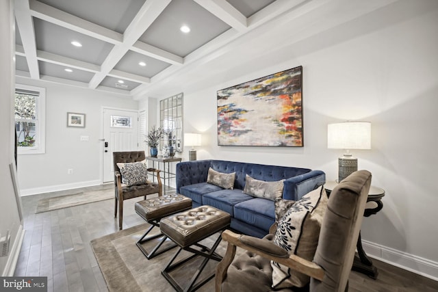 living room with beamed ceiling, coffered ceiling, baseboards, and wood finished floors