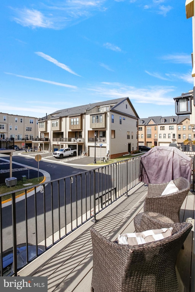 balcony featuring a residential view