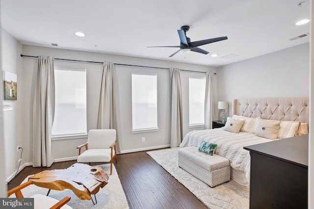 bedroom featuring recessed lighting, visible vents, multiple windows, and dark wood-type flooring