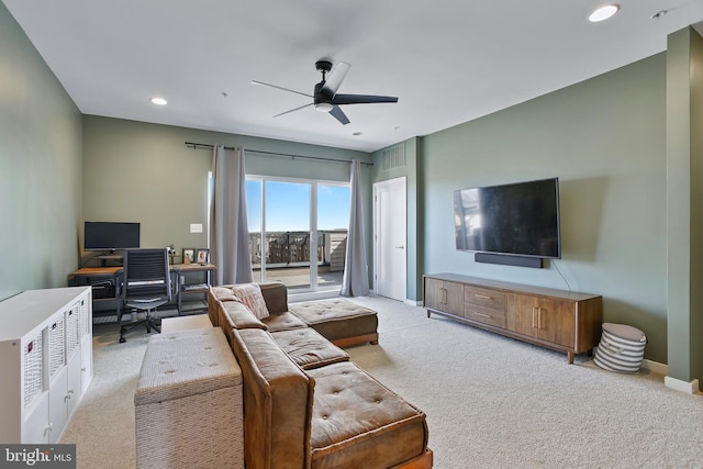 living room with recessed lighting, baseboards, light colored carpet, and ceiling fan