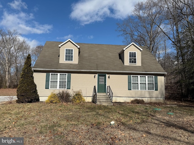 view of new england style home