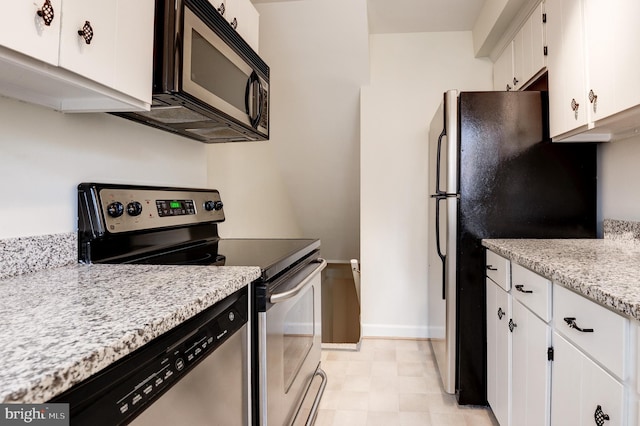 4911 29th Rd S, Arlington, VA 22206 - kitchen featuring stainless steel appliances, white cabinets, and baseboards