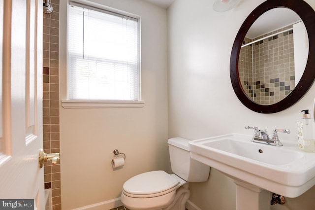 4911 29th Rd S, Arlington, VA 22206 - full bathroom with toilet, healthy amount of natural light, a shower, and baseboards