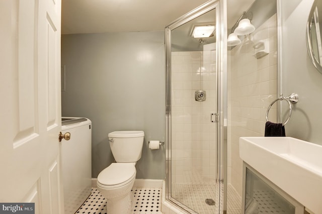 4911 29th Rd S, Arlington, VA 22206 - full bath featuring a stall shower, toilet, baseboards, and tile patterned floors
