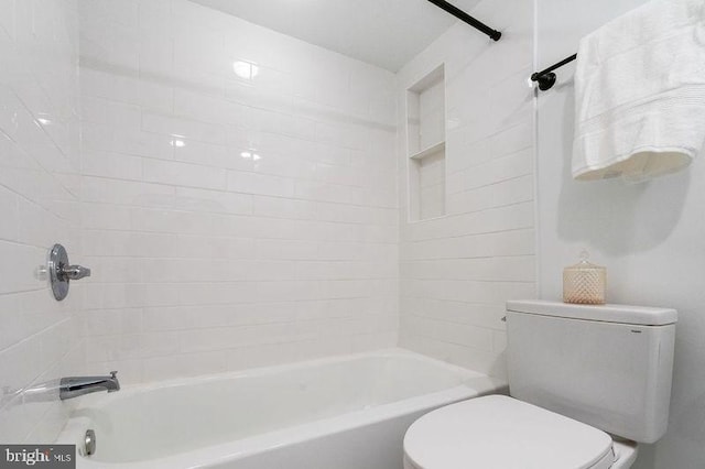 full bathroom featuring toilet and bathing tub / shower combination