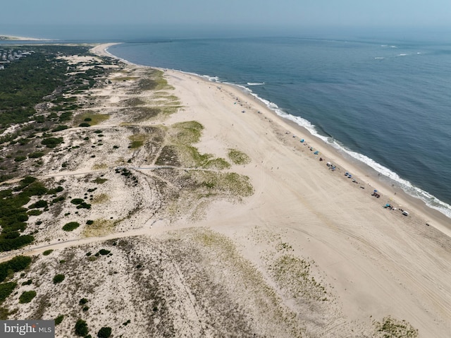 bird's eye view with a beach view and a water view