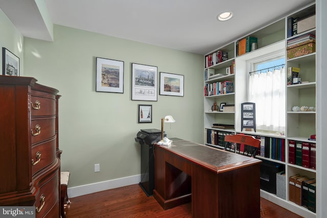 office space with recessed lighting, baseboards, and dark wood finished floors