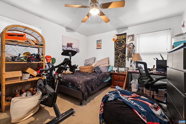 bedroom featuring carpet floors and a ceiling fan