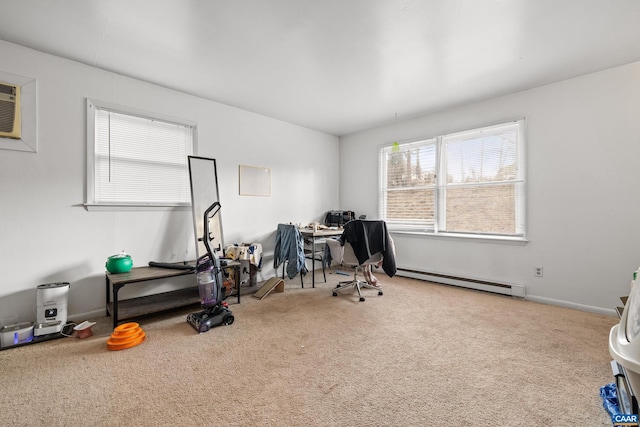 office featuring carpet, a baseboard heating unit, and baseboards