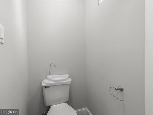 607 N Longwood St, Baltimore, MD 21216 - bathroom featuring toilet