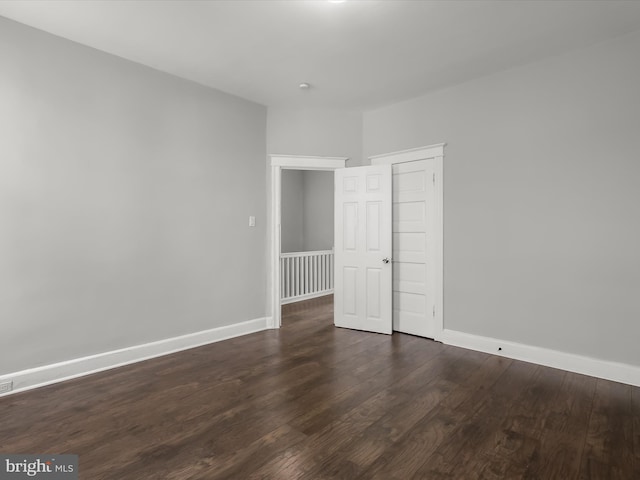 607 N Longwood St, Baltimore, MD 21216 - interior space with baseboards and dark wood-style floors