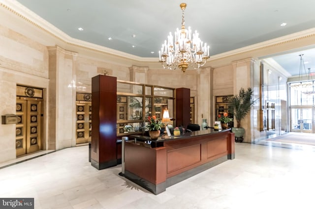 welcome area with an inviting chandelier