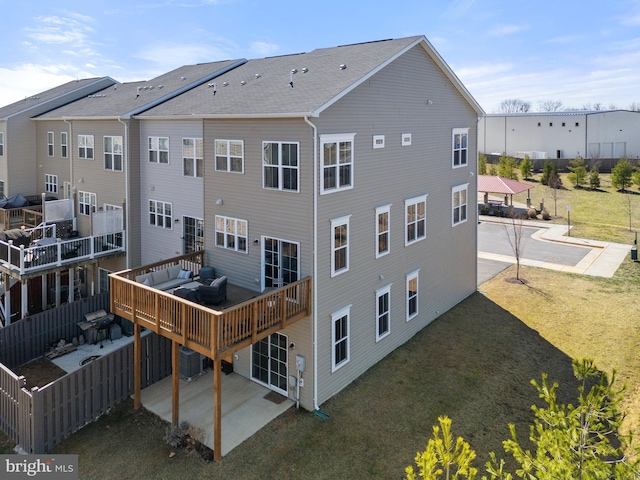 back of house with a patio, central AC, fence, a yard, and a wooden deck