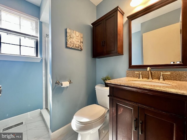 full bath with vanity, toilet, visible vents, and a stall shower