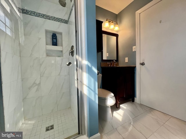 full bath with vanity, marble finish floor, a shower stall, and toilet