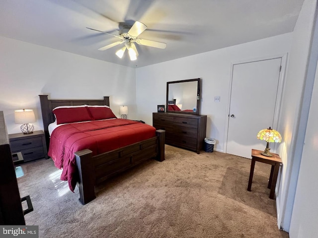 bedroom featuring a ceiling fan and carpet floors