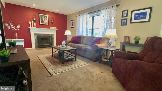 carpeted living room with a fireplace with flush hearth