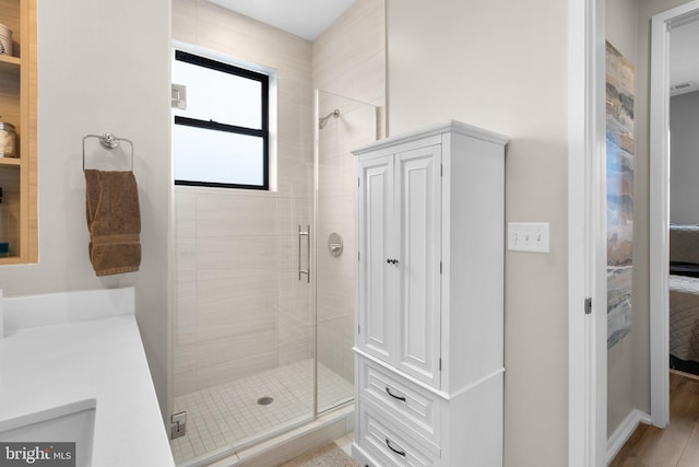 bathroom featuring a shower stall