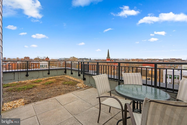 view of patio featuring outdoor dining space