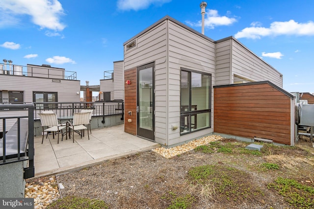 rear view of house with a patio area