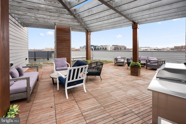 view of patio with an outdoor living space, a view of city, and a pergola