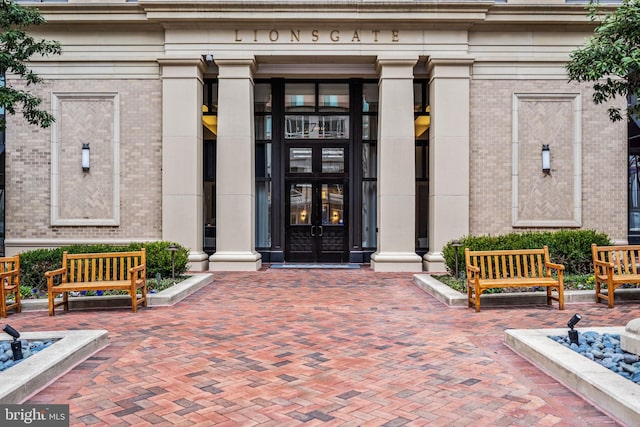 entrance to property with french doors and brick siding