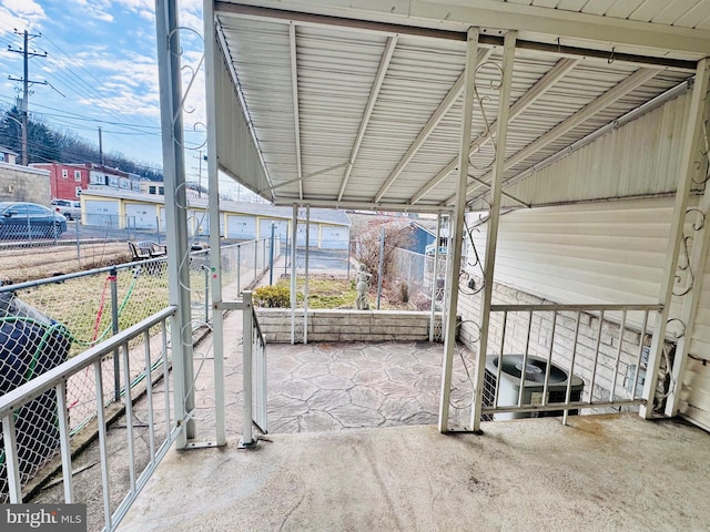 view of patio / terrace featuring fence