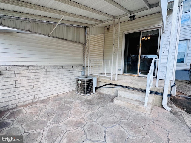 view of patio / terrace with central air condition unit