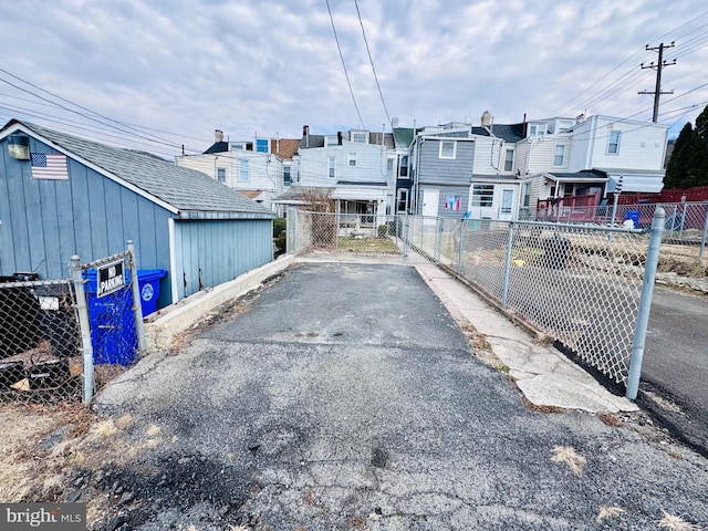 view of street featuring a residential view and driveway