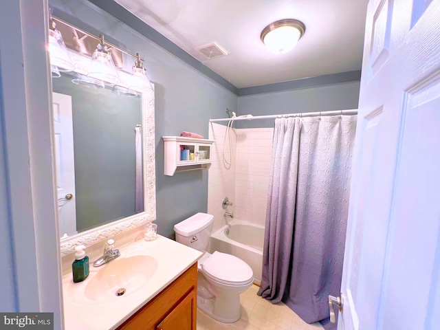 bathroom featuring vanity, visible vents, shower / bath combo with shower curtain, tile patterned floors, and toilet