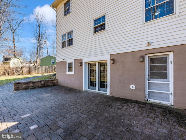 view of patio / terrace featuring fence