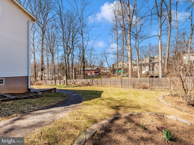 view of yard featuring fence