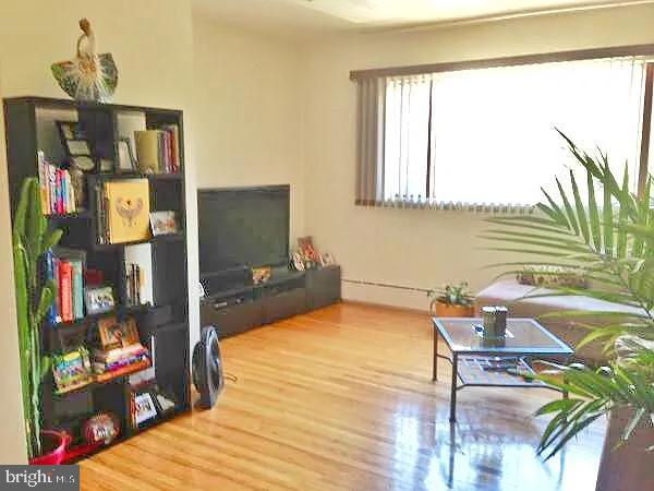 living room with wood finished floors