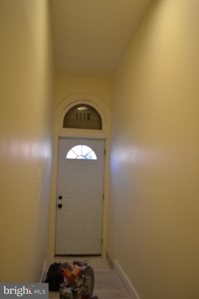 doorway with baseboards