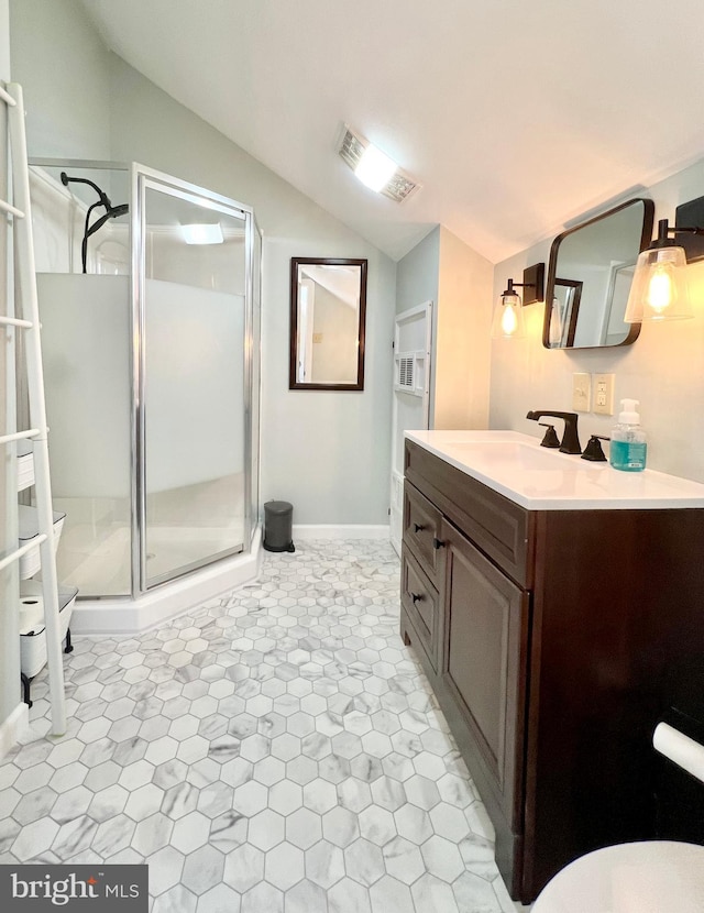 bathroom with a stall shower, visible vents, lofted ceiling, toilet, and vanity