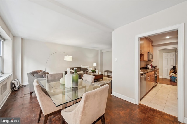 dining room with baseboards