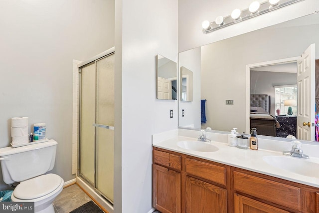 bathroom with ensuite bath, toilet, a shower stall, and a sink