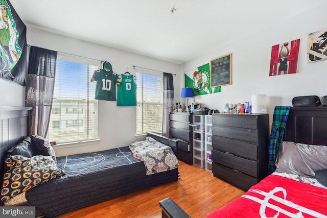 bedroom featuring wood finished floors