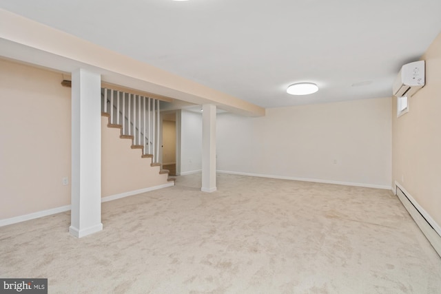 finished below grade area featuring a baseboard heating unit, baseboards, stairway, a wall unit AC, and carpet floors