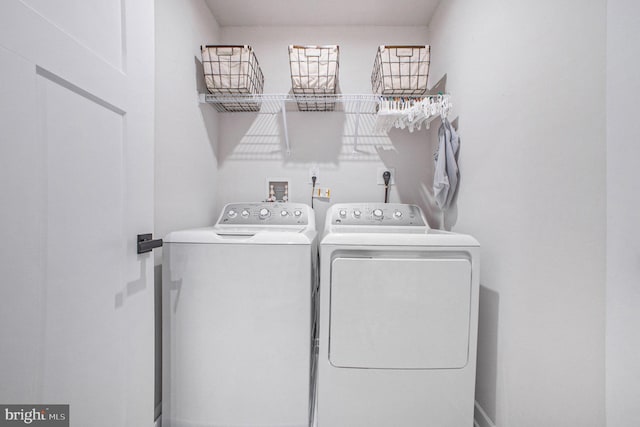 laundry room featuring laundry area and independent washer and dryer