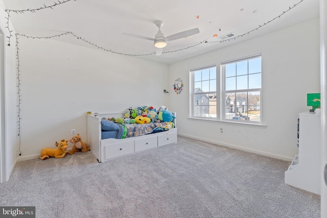 unfurnished bedroom with carpet floors, ceiling fan, visible vents, and baseboards