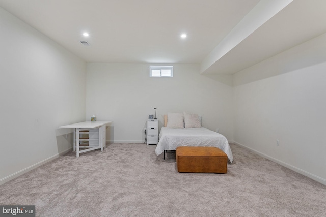 carpeted bedroom with recessed lighting, visible vents, and baseboards